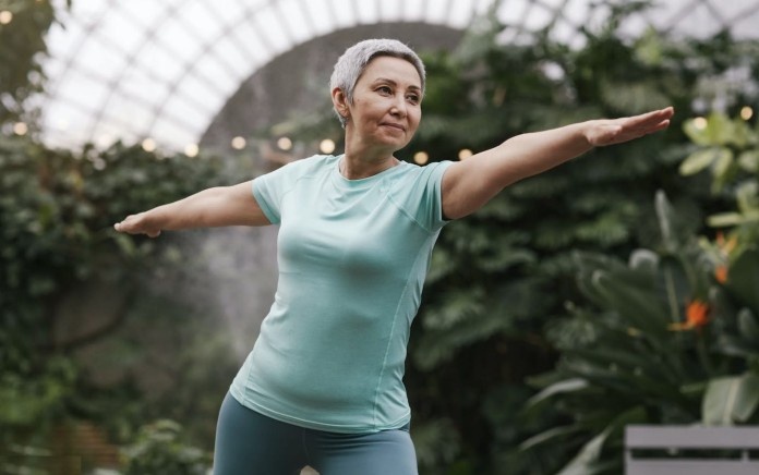 senior woman practicing Tai Chi