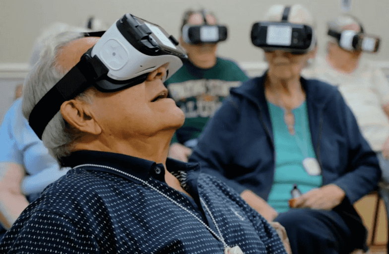 seniors using virtual reality game headsets
