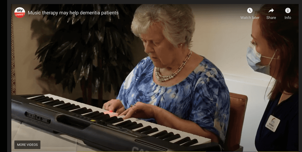 senior woman playing a musical keyboard